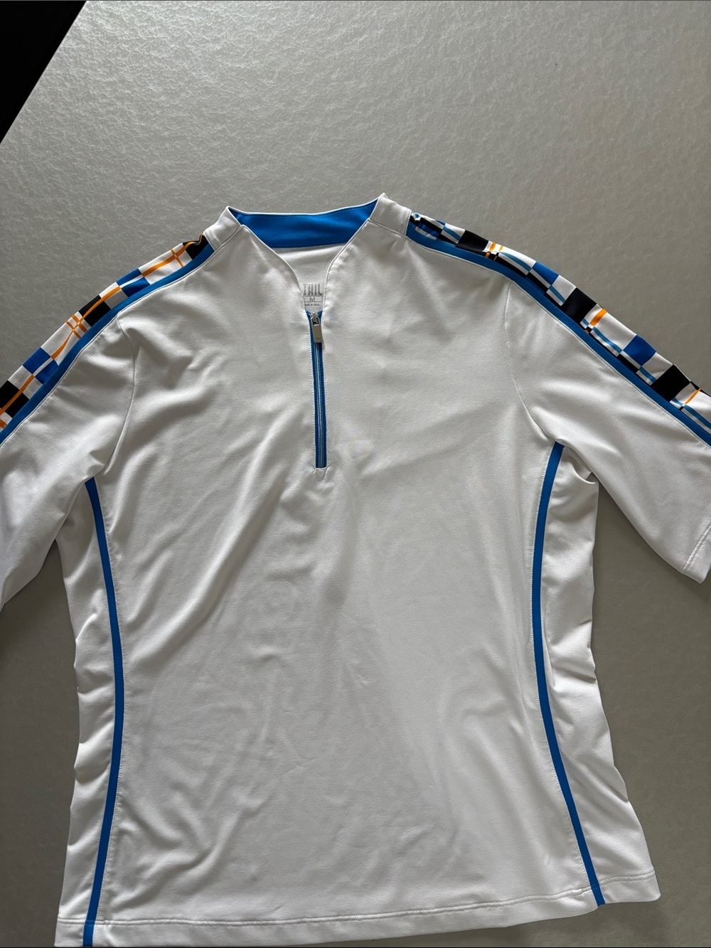 Tail Womens Golf top with Blue Trim and Multicolor Shoulder Accents/ M